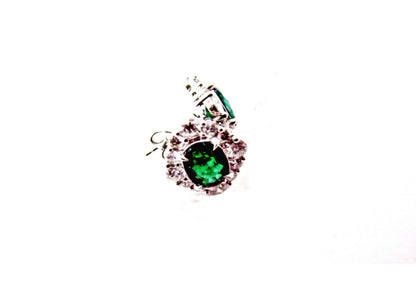emerald two oval set triangular halo stud earring