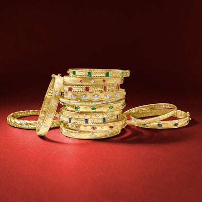 0.80 Ct. T.W. Emerald and .26 Ct. T.W. Diamond Bangle Bracelet in 18Kt Gold over