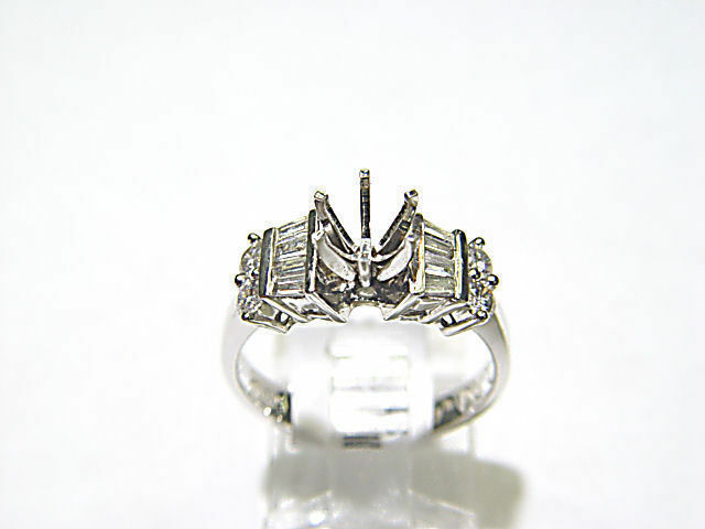 4 ROUND BRILLIANT BAGUETTE DIAMOND SETTING