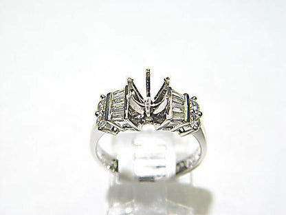 4 ROUND BRILLIANT BAGUETTE DIAMOND SETTING