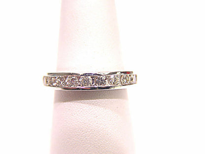 DIAMOND ARE SET ALL THE WAY AROUND THE BAND ETERNITY SET DIAMOND