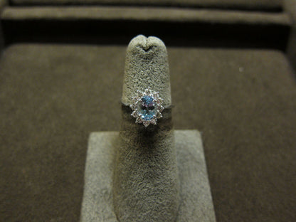 OVAL AQUAMARINE SET ROUND BRILLIANT SHAPE DIAMOND ROUND