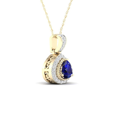 Imperial Gemstone 10K Yellow Gold Pear Cut Blue Sapphire 1/20 CT TW Diamond Halo