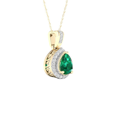 Imperial Gemstone 10K Yellow Gold Emerald 1/10 CT TW Diamond Halo Necklace