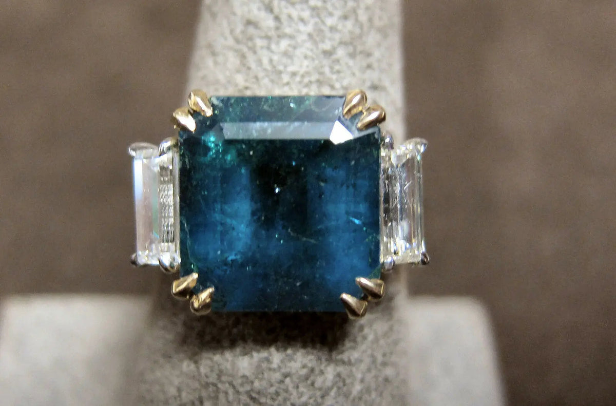 square emerald diamond 7.91 ct emerald shape side .86 ct set ring