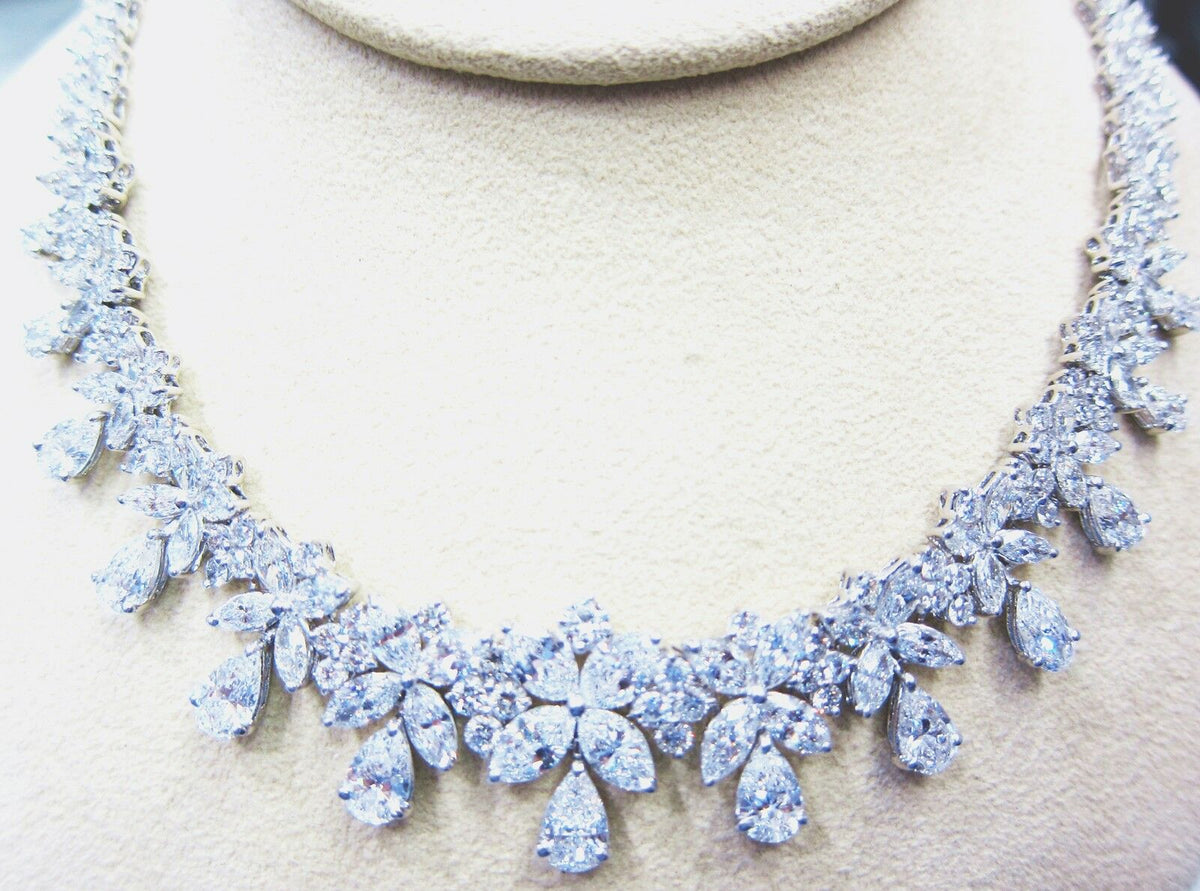 Diamond pear shape marquise round brilliant diamond shape diamond set necklace