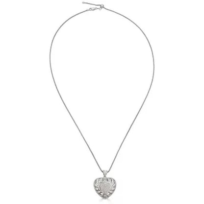 0.24 CT. T.W. Diamond Puffed Heart Pendant in Sterling Silver, Adjustable to 25"