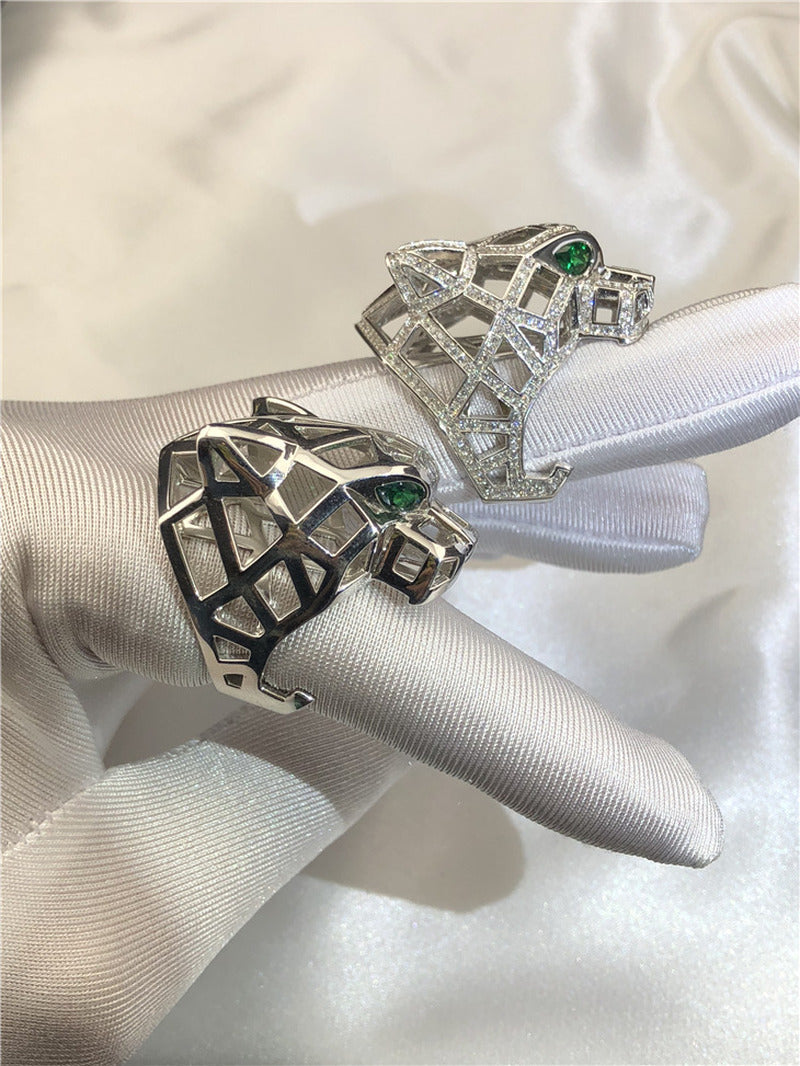 Silver Ring with Diamond-Free Gold and Green Eyes and Emeralds