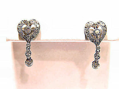 ROUND BRILLIANT CUT BEZEL AND PRONG SET DIAMOND ANTIQUE