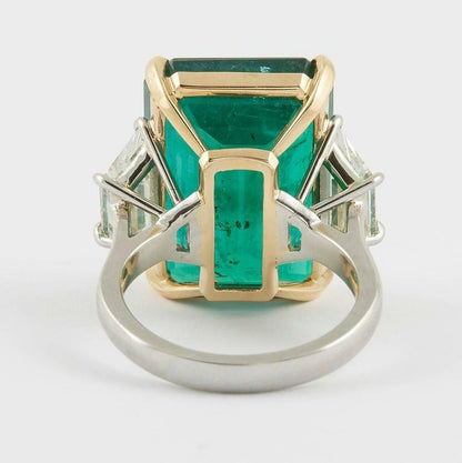 GIA certified 18.83 carat emerald set along 2.08 carat of side diamonds