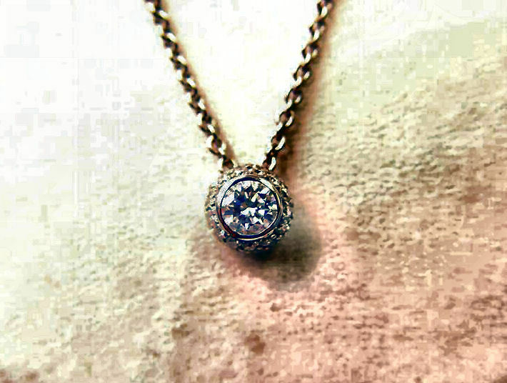 ROUND BRILLIANT CUT DIAMOND PENDANT .41 CT CENTER .33 CT