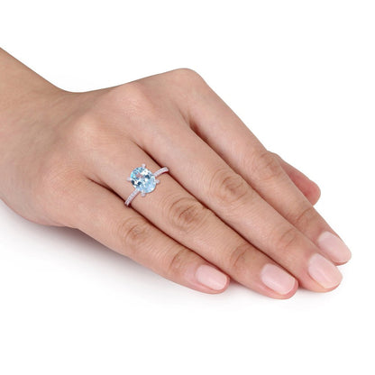 Miabella Women'S 3-4/5 Carat Oval-Cut T.G.W. Sky-Blue Topaz 1/4 Carat T.W. Diamo