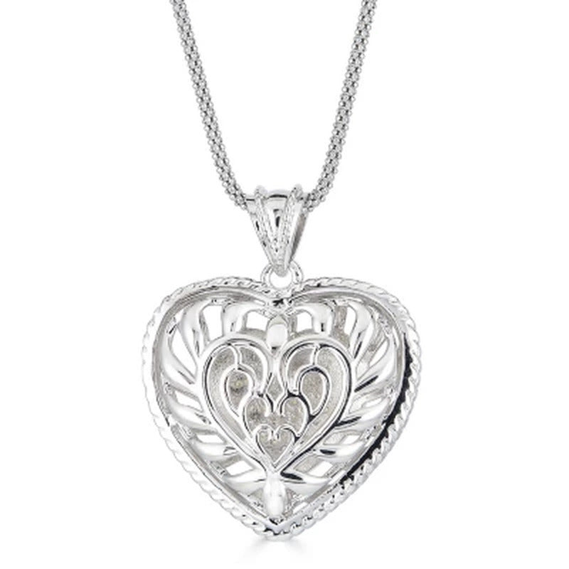0.24 CT. T.W. Diamond Puffed Heart Pendant in Sterling Silver, Adjustable to 25"
