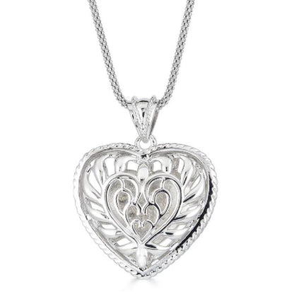 0.24 CT. T.W. Diamond Puffed Heart Pendant in Sterling Silver, Adjustable to 25"