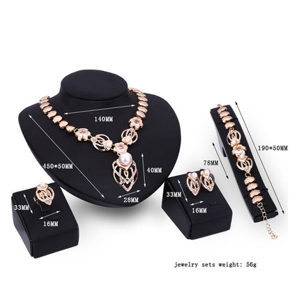 Pearl and Diamond Four-Piece Necklace and Earrings