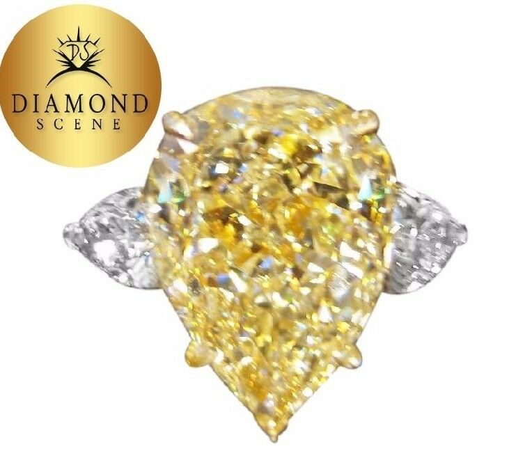 GIA CERTIFIED FANCY LIGHT YELLOW PEAR SHAPE SI2 SIDE PEAR ENGAGEMENT RING