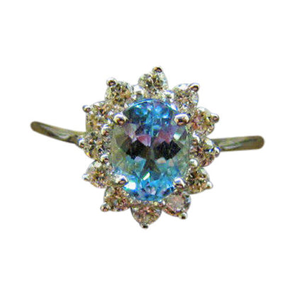 OVAL AQUAMARINE SET ROUND BRILLIANT SHAPE DIAMOND ROUND