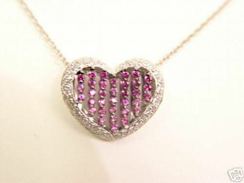 PINK SAPPHIRE ROUND SHAPE .67 CT AND ROUND BRILLIANT SHAPE DIAMOND