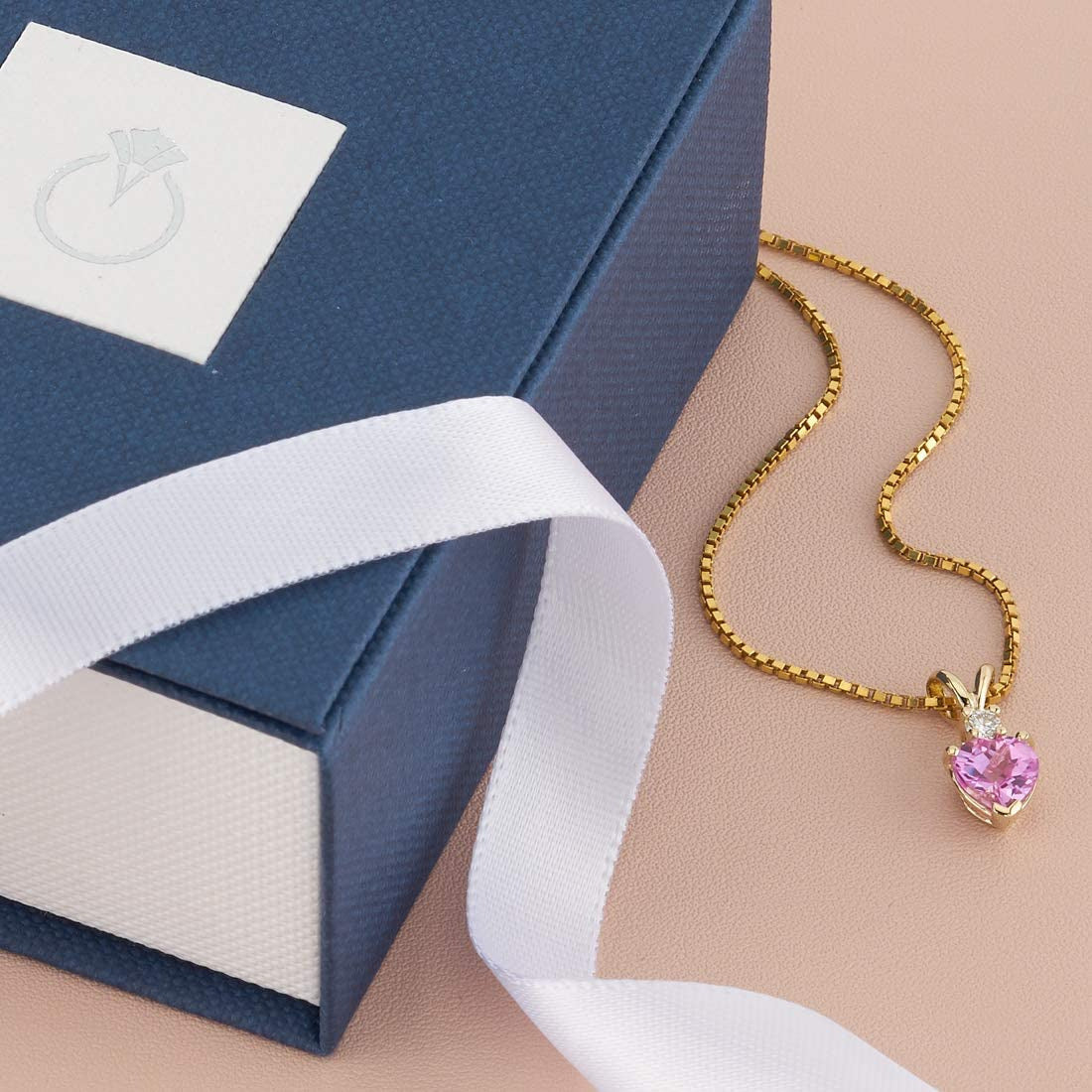 Created Pink Sapphire with Genuine Diamond Pendant in 14 Karat Yellow Gold, Hear