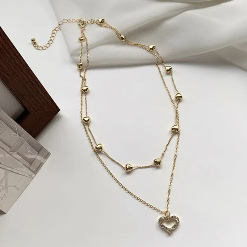 Gold Double Heart Necklace with Diamonds