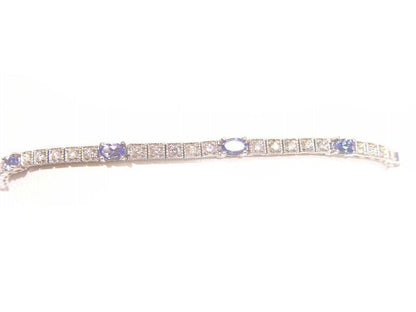 8 OVAL SHAPE TANZANITE 2.05CT WITH 40 ROUND BRILLIANT SH DIAMOND BOX SET 1.34 CT