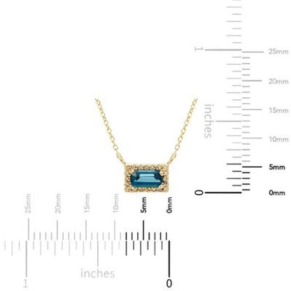 London Blue Topaz and .06 CT. T.W. Diamond Baguette Pendant Necklace in 14K Gold