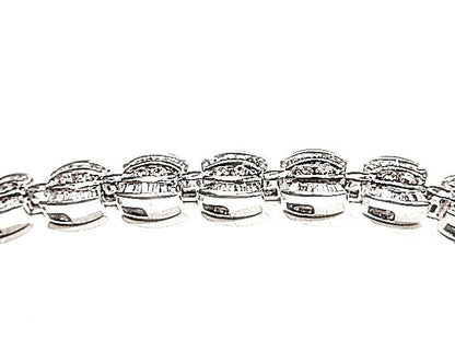 ROUND BRILLIANT BAGUETTE SHAPE DIAMOND CHANNEL SET DIAMOND TENNIS BRACELET