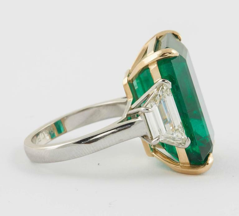 GIA certified 18.83 carat emerald set along 2.08 carat of side diamonds