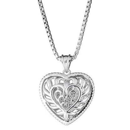 0.24 CT. T.W. Diamond Puffed Heart Pendant in Sterling Silver, Adjustable to 25"