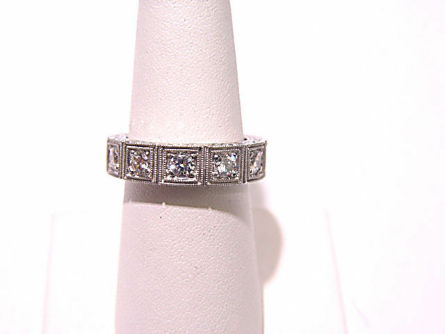 8 DIAMONDS SET 3/4 WAY DOWN FOR AN ALL AROUND LOOK