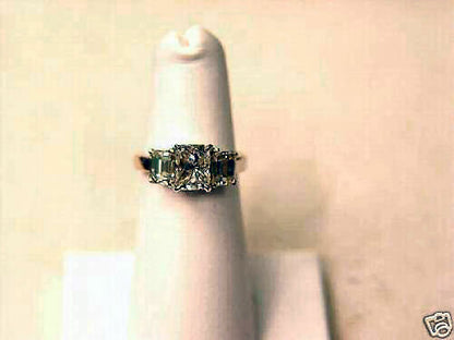 RADIANT CUT DIAMOND CENTER 4 PRONG SET 1.50 CT SIDES 2 SET