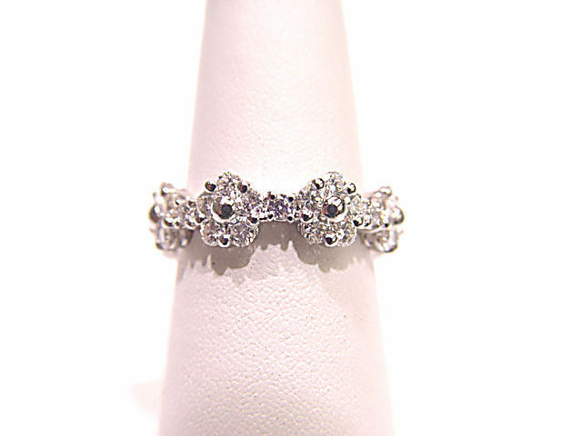 DIAMONDS ARE BEAUTIFULLY SET ALL AROUND ETERNITY BAND