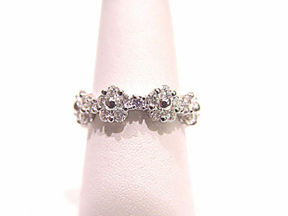 DIAMONDS ARE BEAUTIFULLY SET ALL AROUND ETERNITY BAND