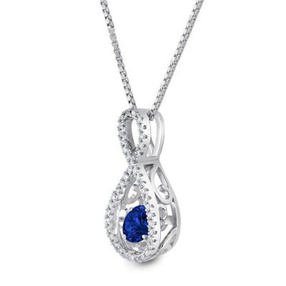 Dancing Lab Created Blue Sapphire and 0.12 CT. T.W. Diamond Infinity Pendant in