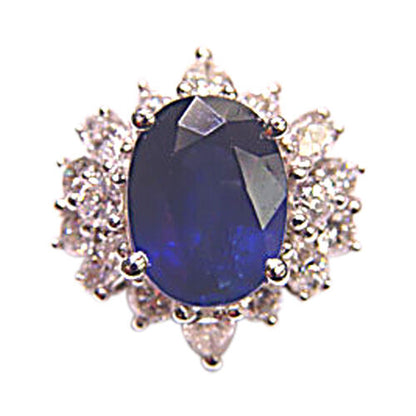OVAL BLUE SAPPHIRE SET WITH ROUND BRILLIANT MARQUISE