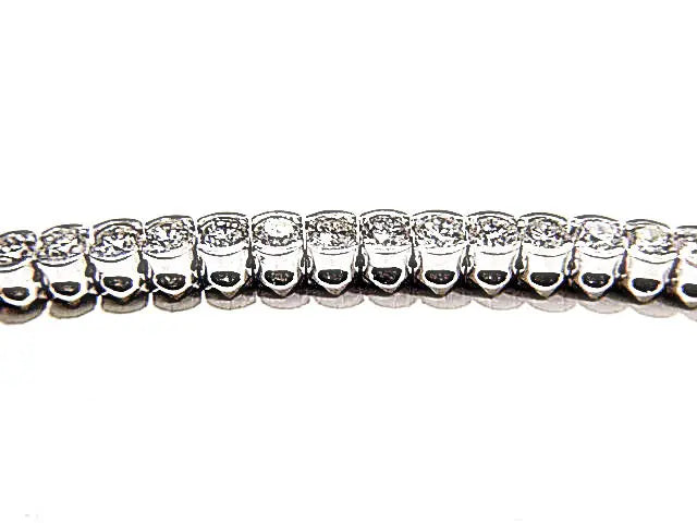 61 ROUND BRILLIANT CUT DIAMONDS HALF BEZEL SET DIAMOND