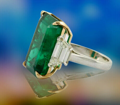 GIA certified 18.83 carat emerald set along 2.08 carat of side diamonds