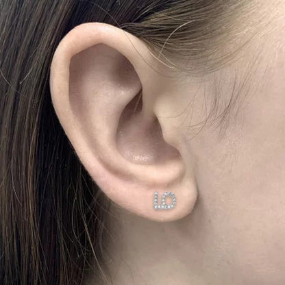Love Earrings and 0.11 CT. T.W. Diamonds in Sterling Silver