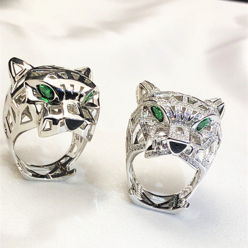 Silver Ring with Diamond-Free Gold and Green Eyes and Emeralds