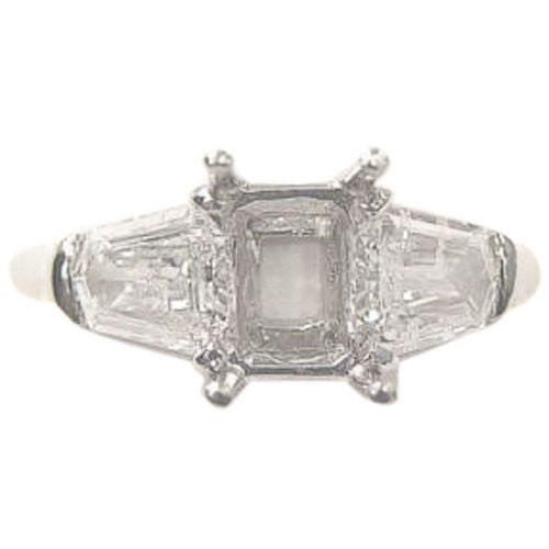 PLATINUM SETTING AND 2 NATURAL SHEILD CUT DIAMOND