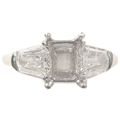 PLATINUM SETTING AND 2 NATURAL SHEILD CUT DIAMOND