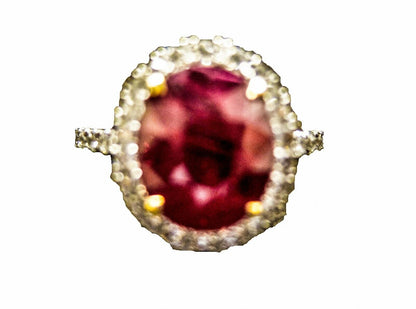 Ruby oval shape 5.02 ct and diamond ring 18 k white gold