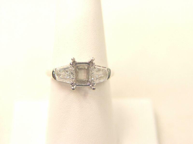 PLATINUM SETTING AND 2 NATURAL SHEILD CUT DIAMOND