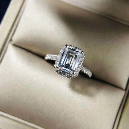 Emerald Cutter Proposes and Engages Moissanite Diamond Ring