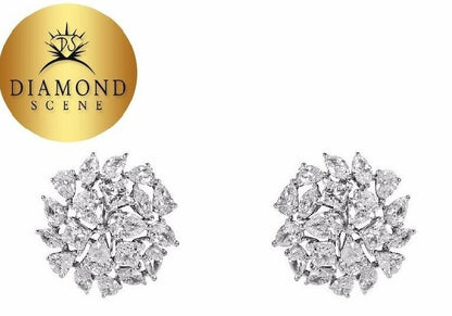 6.25 carats of F/G color VS clarity diamonds. This earring features pear, marque
