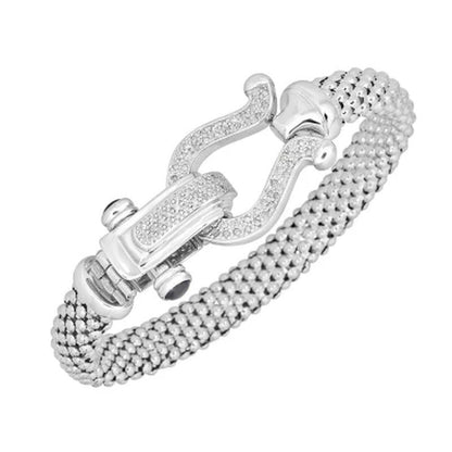 0.32 CT. T.W. Diamond Horseshoe Bracelet in Italian Sterling Silver