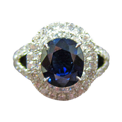 OVAL DEEP BLUE SAPPHIRE ROUND BRILLIANT PRONG SET DIAMOND