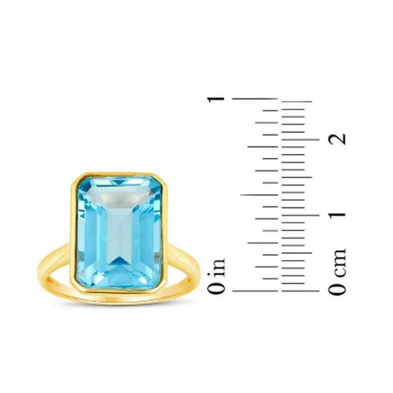 Sky Blue Topaz Emerald Shaped Ring in 14 Karat Yellow Gold