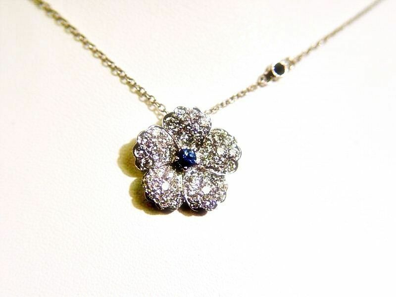 DIAMOND FLOWER PENDANT .90 CT AND BLUE SAPPHIRE .13 CT