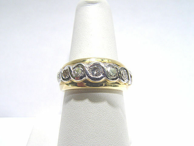 DIAMOND 7 ROUND BRILLIANT SHAPE BEZEL SET DIAMOND BAND
